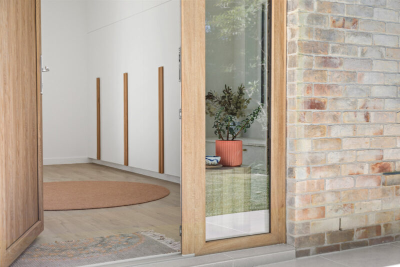 uPVC entrance door in turner oak malt uPVC, with double glazed sidelight.