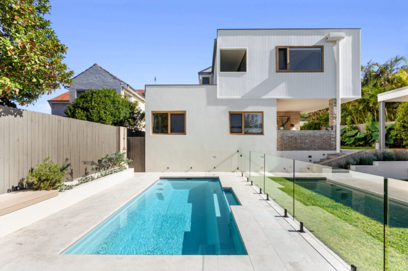 Backyard exterior pool view with uPVC turner oak malt windows with double glazing.