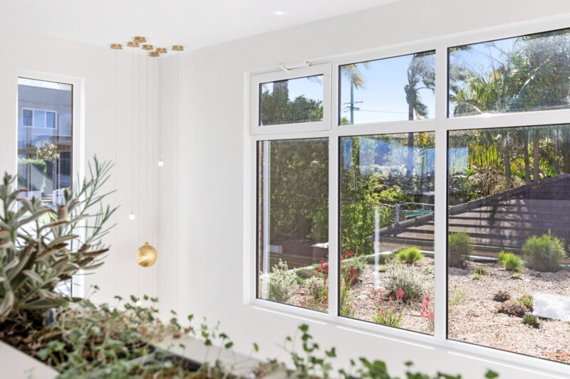 Interior view of white uPVC windows with highlights.
